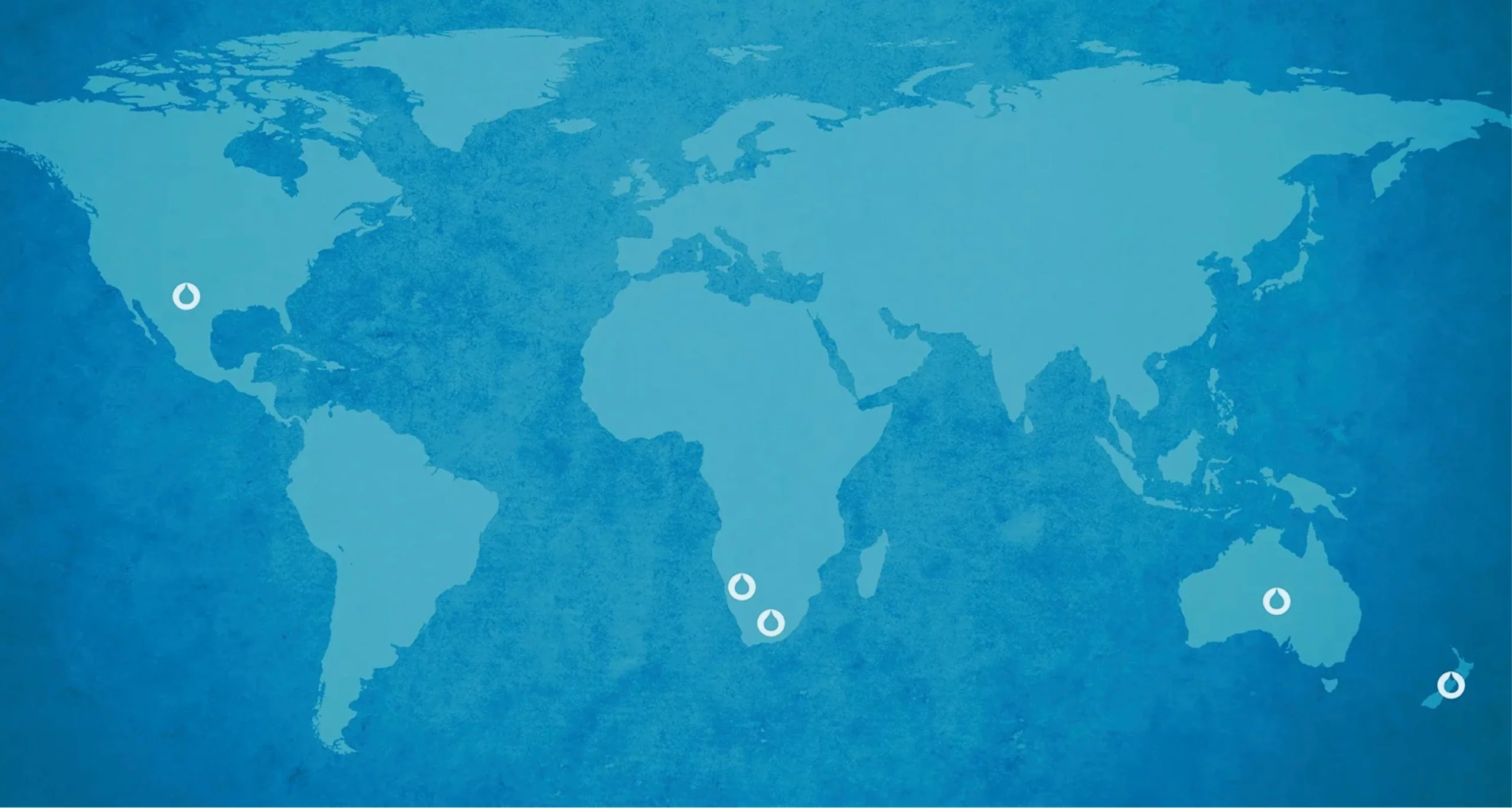 World map graphic highlighting multiple international locations across North America, Africa, and Australia where the company operates.